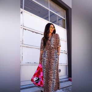 Dressed in Lala Ćest la Vie Plissé Skirt Set in Go Get 'Em Tiger size Medium